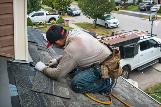 Professional Roof Repair technician working in Morganville, NJ